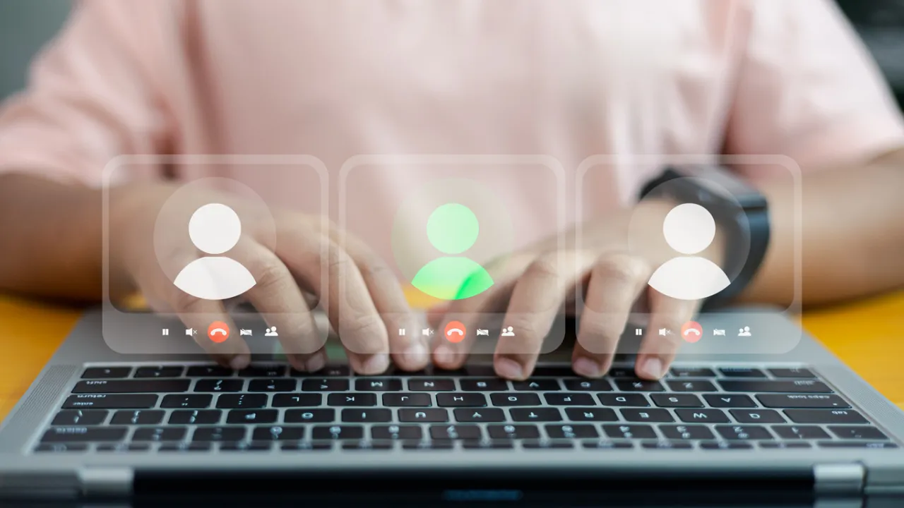 Photo of a laptop with a graphical transparent overlay of videoconferencing screens.